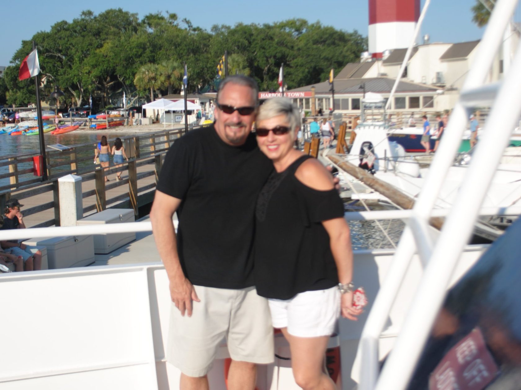 a person standing in front of a boat