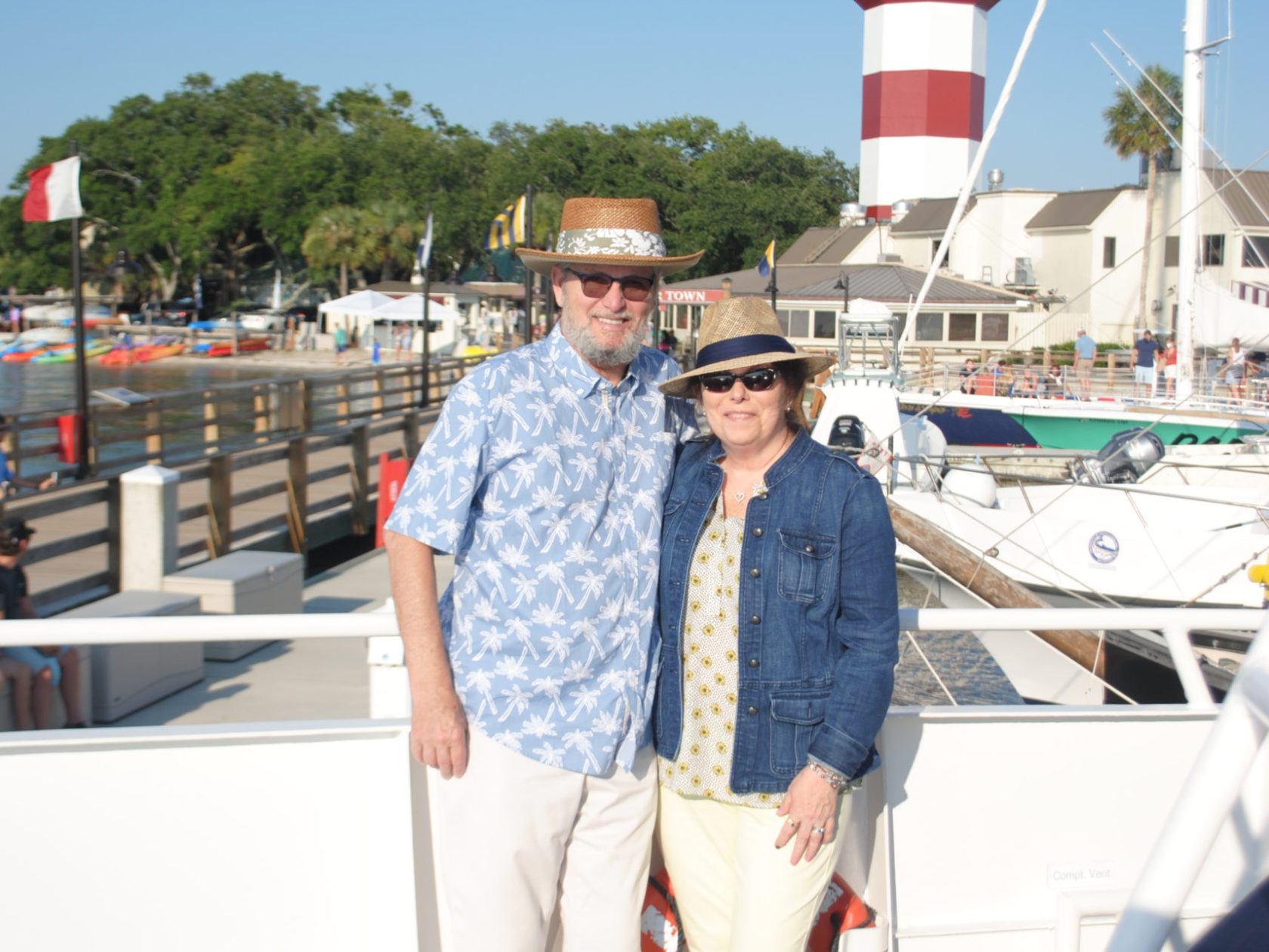 a man standing in front of a boat