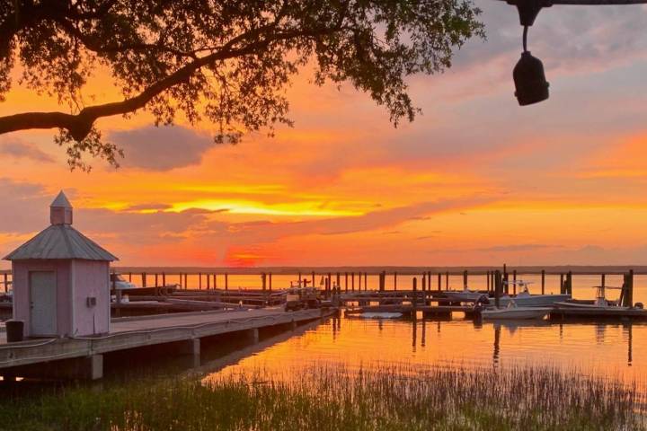 a sunset over a body of water