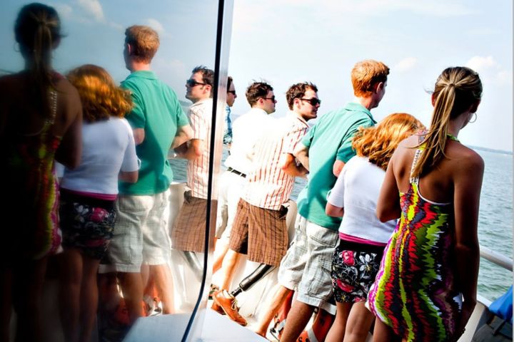 a group of people standing next to a person