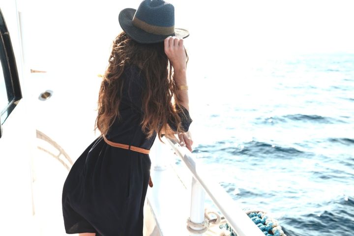 a person standing in front of water