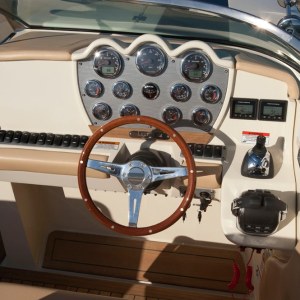 a stove top oven sitting inside of a car