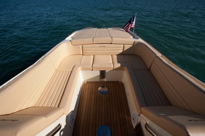 a wooden boat in a body of water